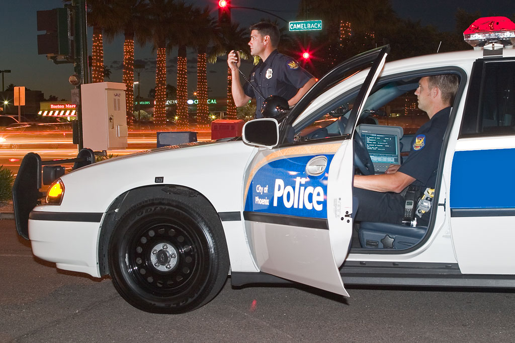 Phoenix Police officer in patrol vehicle