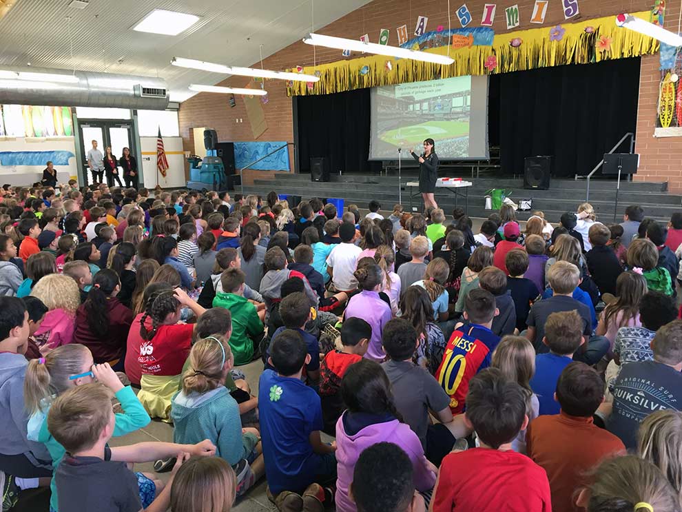 Zero waste team presenting at a school assembly