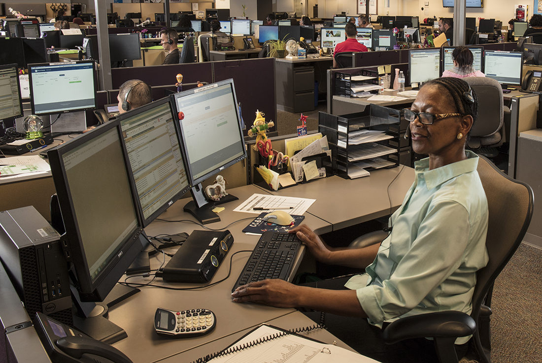 Customer Services Staff at desk