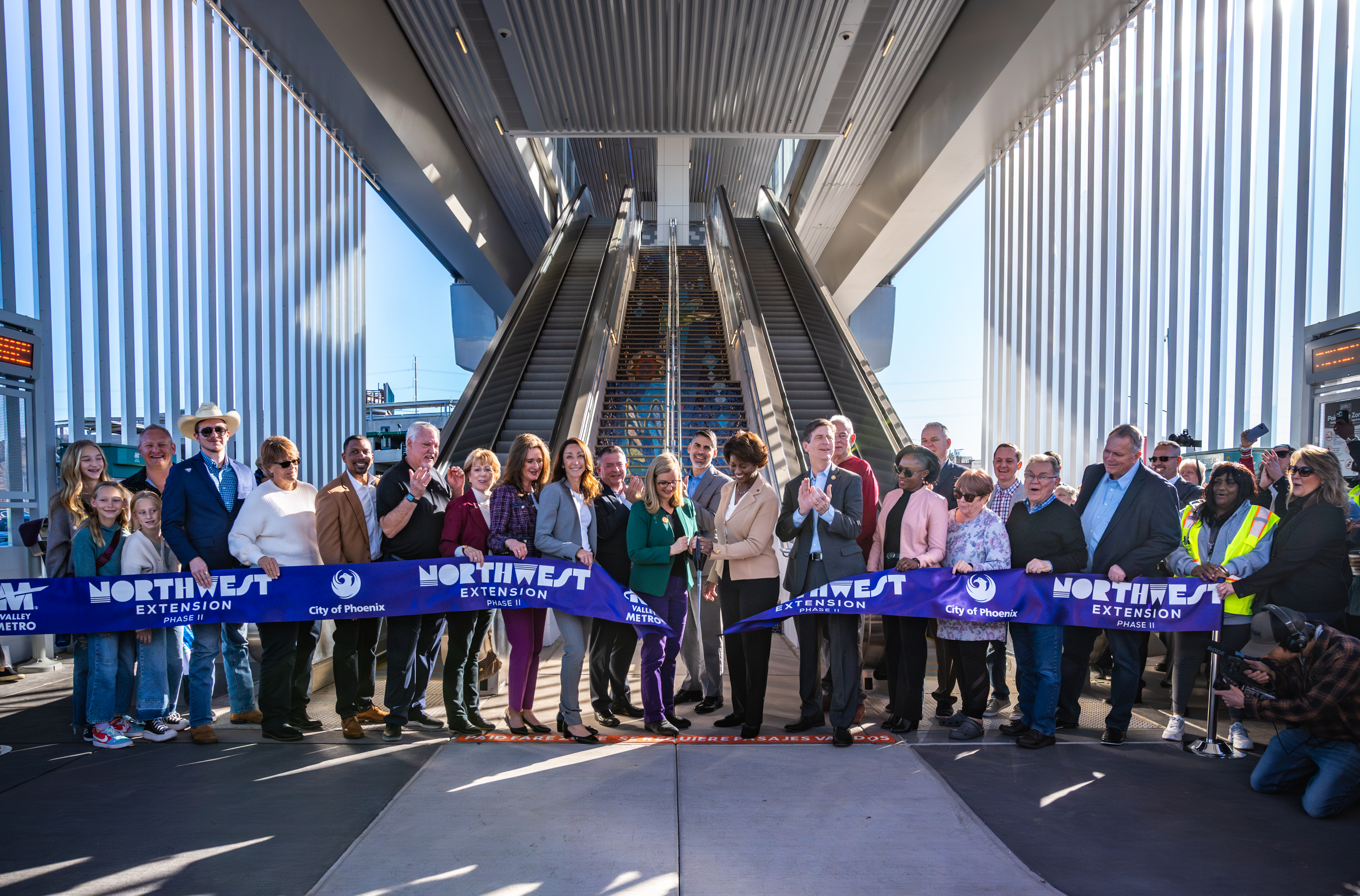 Mayor Kate Gallego and FTA Administrator Nuria Fernandez are joined by local and federal offcials to celebrate the grand opening and ribbon-cuttin of the new Northwest Extension II project at the Thelda Williams Transit Center in Phoenix.