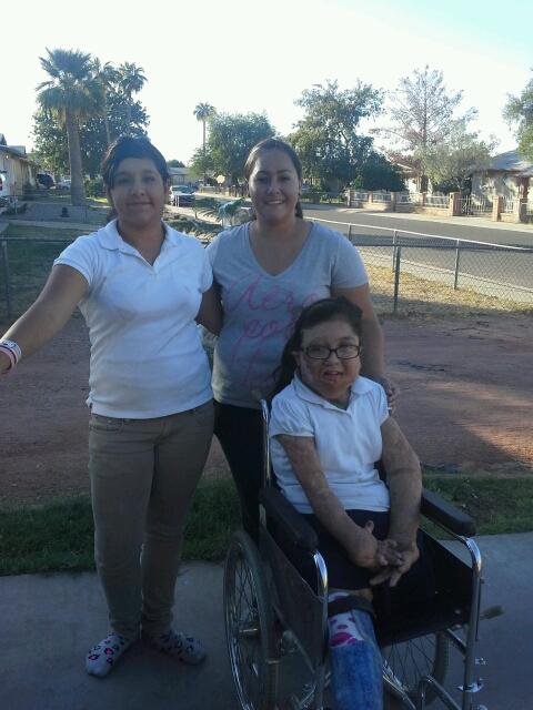 Girl with family - 400 wheelchair