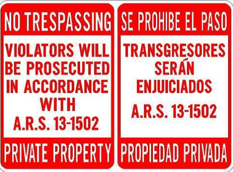 No tresspassing sign examples in English and Spanish.