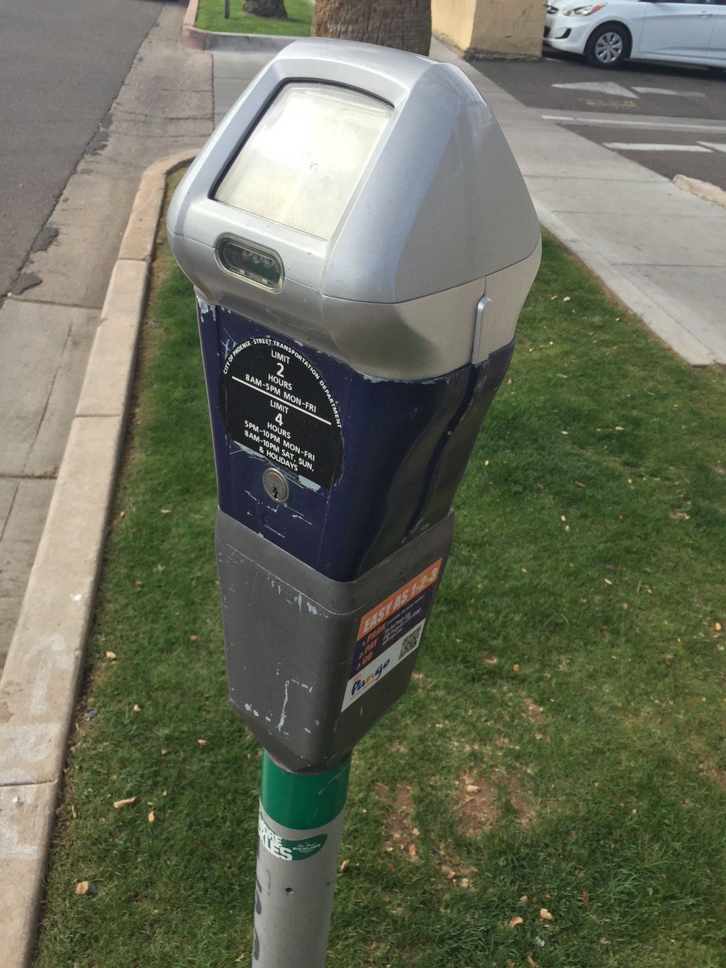 Parking meter by curb