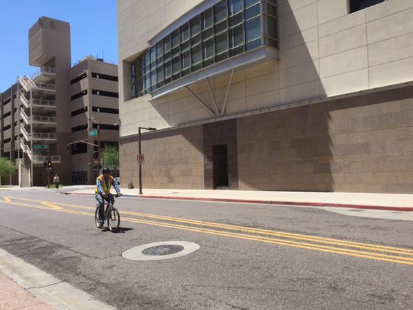 City inspector riding bicycle